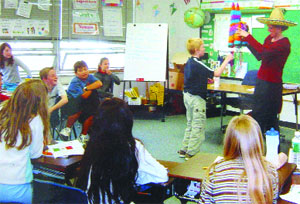 Paula Maida and her students