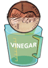 Penny and measuring cup with vinegar